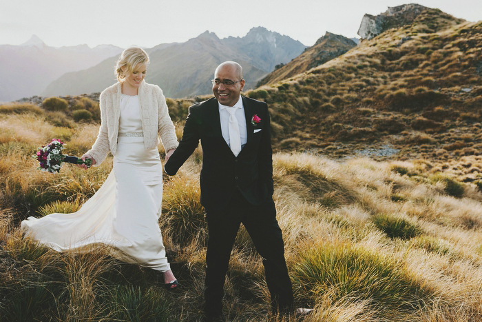 Bride and Groom walking on mountaintop, Natural, Mt Aspiring Wedding, New Zealand, Wanaka