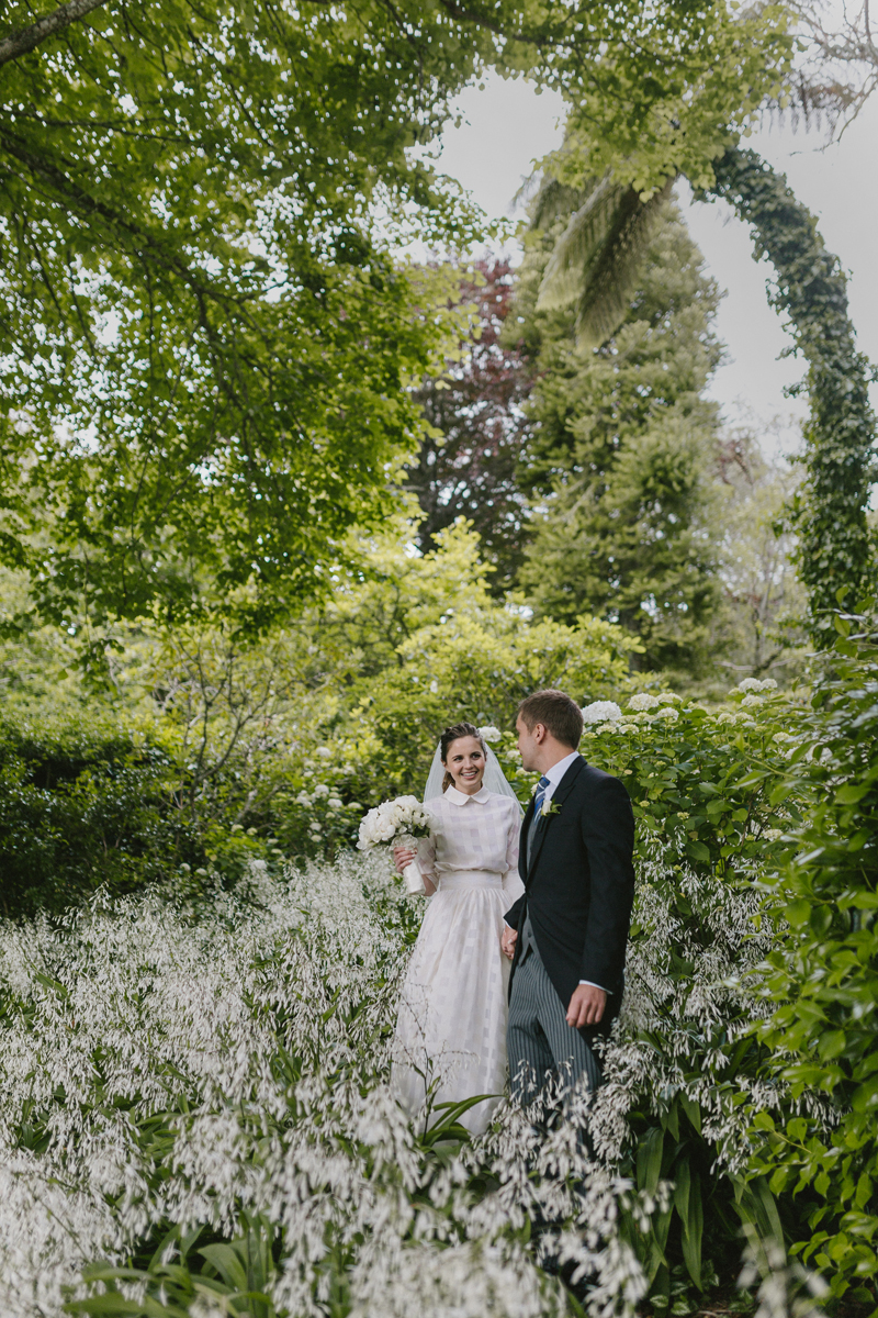 bride and groom in garden