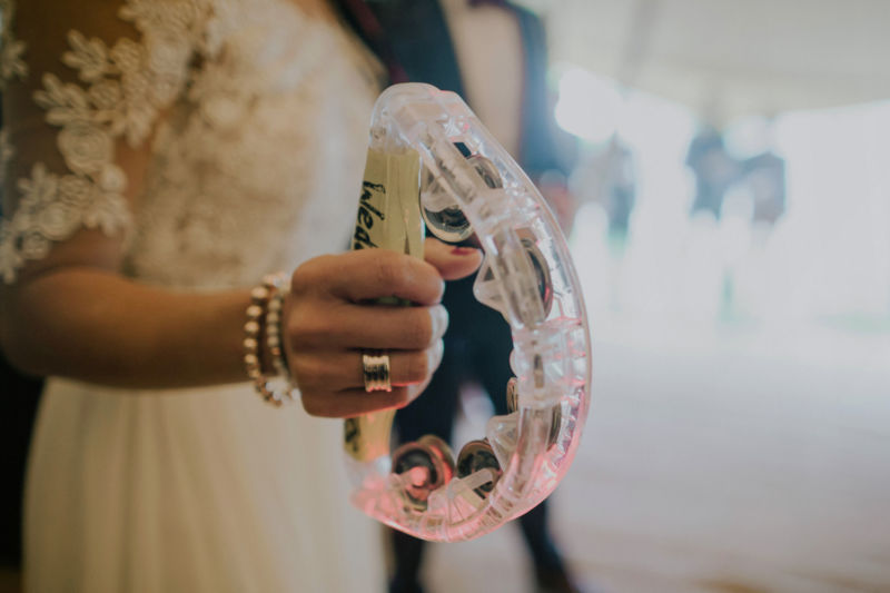 close up of tambourine in brides hand