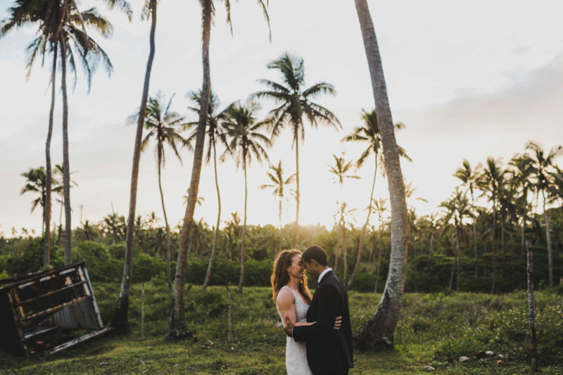 bride and groom sunset in coconut trees