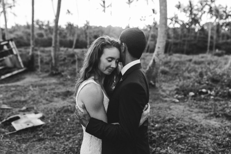 close up b&w bride and groom embracing