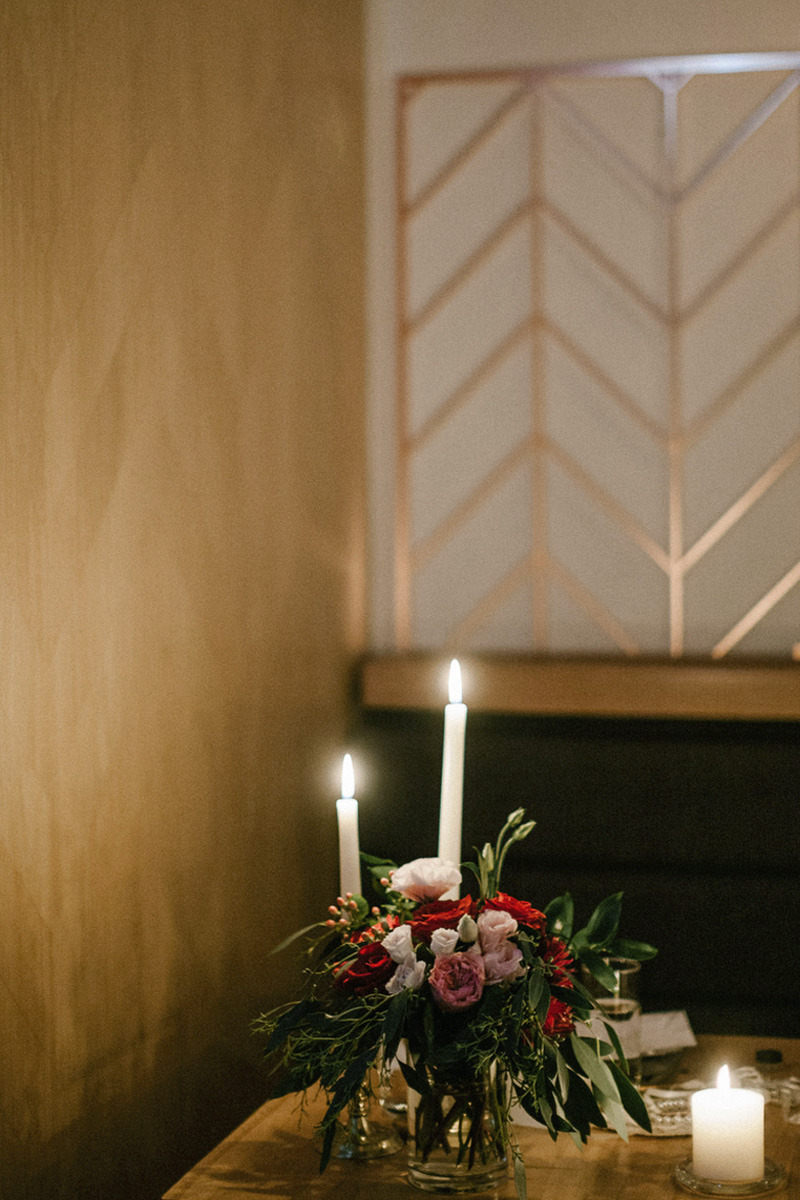 candle light and flowers on table