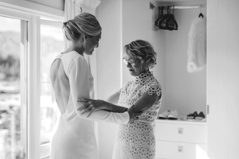 mother admiring bride in nice moment