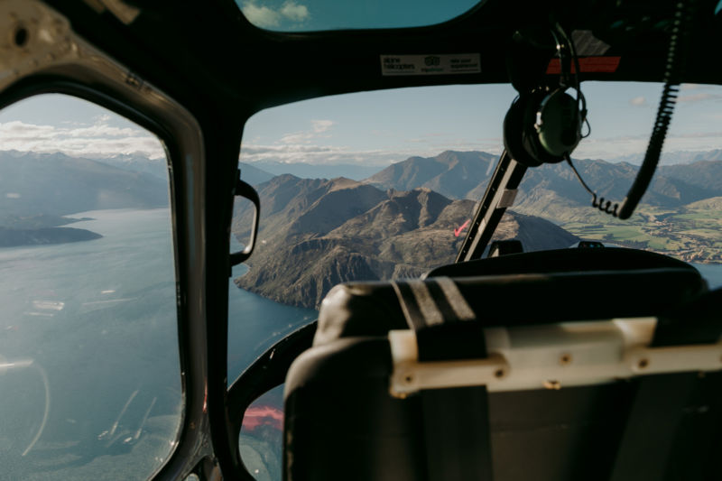 view of wanaka out of helicopter window