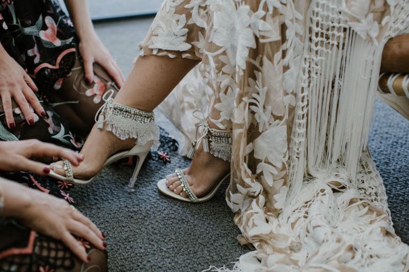 close up of brides shoes