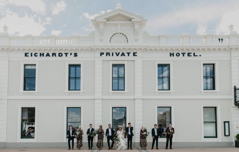 bridal party in front of eichardts private hotel