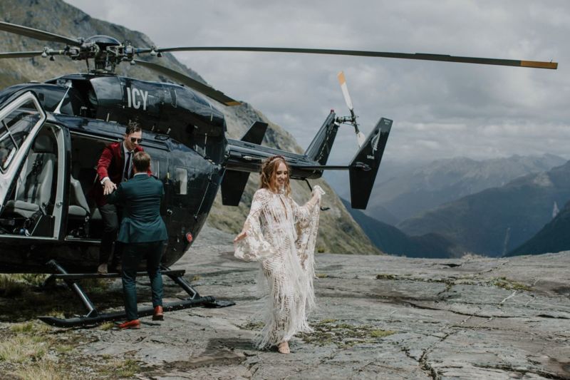 bride stepping out of helicopter