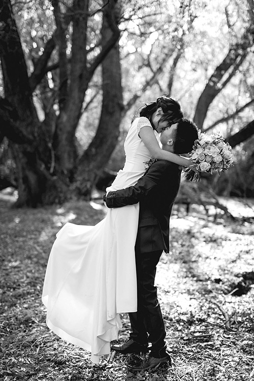 Bride and groom kissing - Queenstown wedding photographer