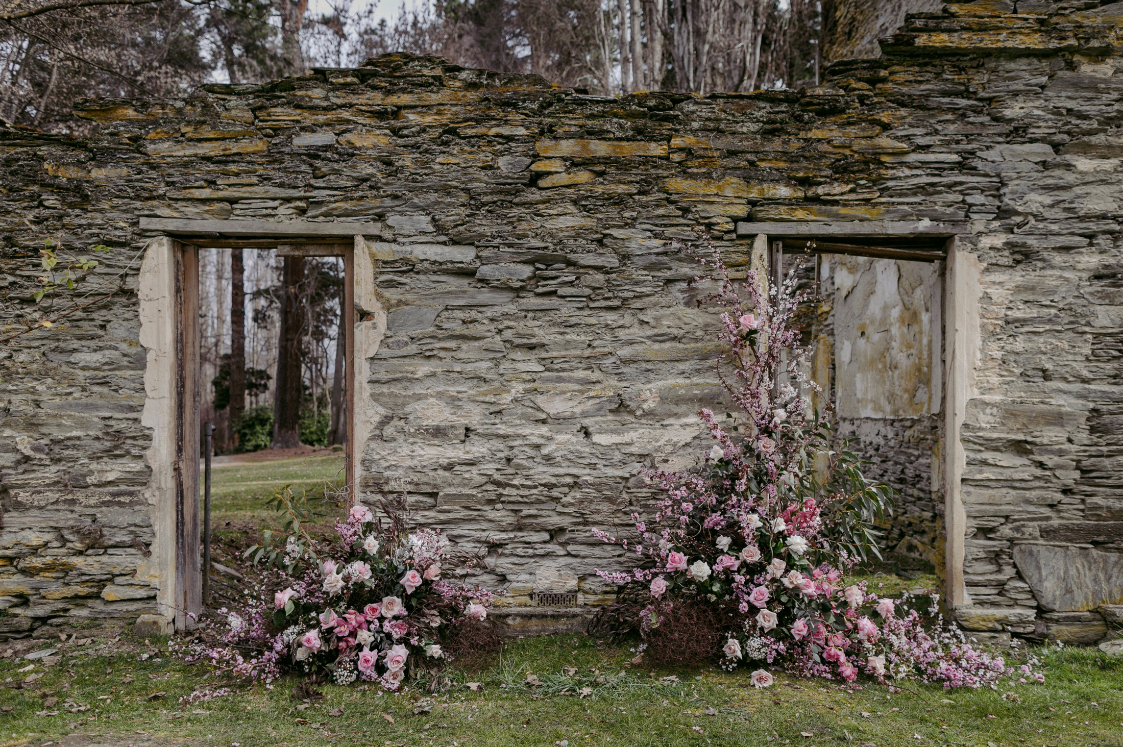 Thurlby Domain ruins with pink floral arrangement decor for the ceremony