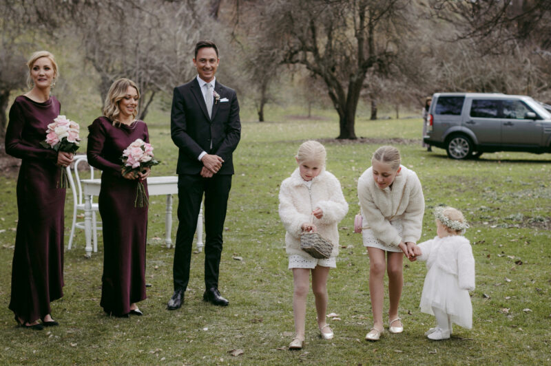 Flower girls walking up the aisle