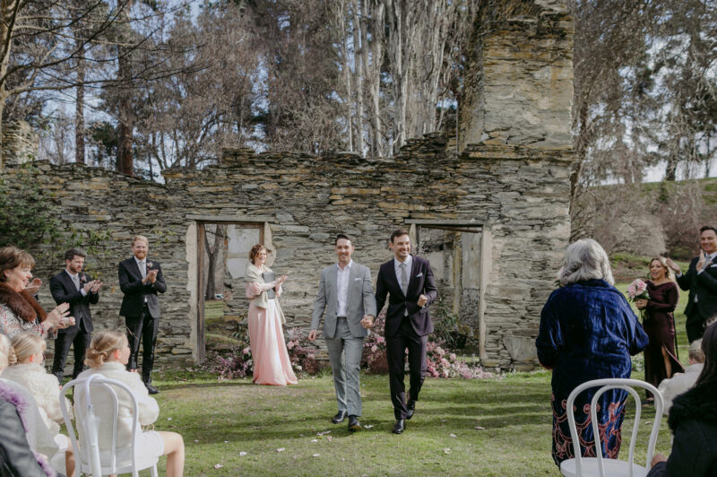 Liam and Steve just married, walking back down the aisle