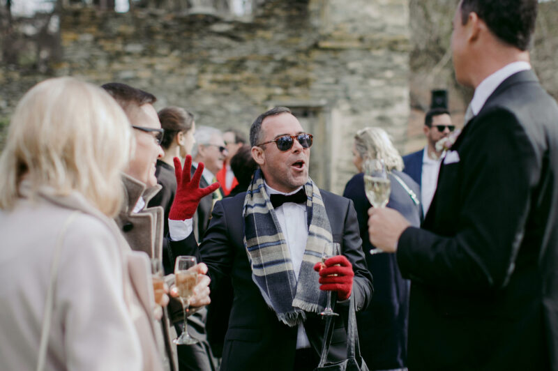 Candid of stylish guest in an animated moment of joy