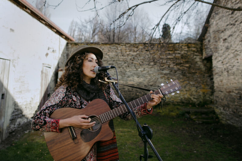 A singer providing a tune at reception venue