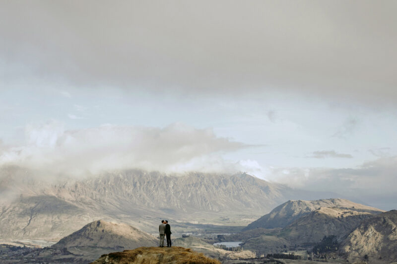 Liam and Steve portrait at Skippers canyon overlooking the Remarkables in a big wide scene