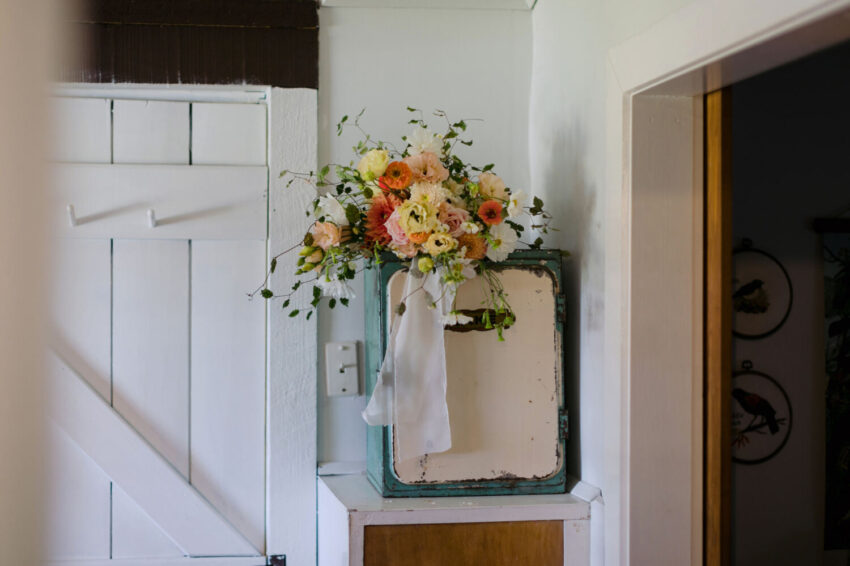 Bouquet of flowers on bread box