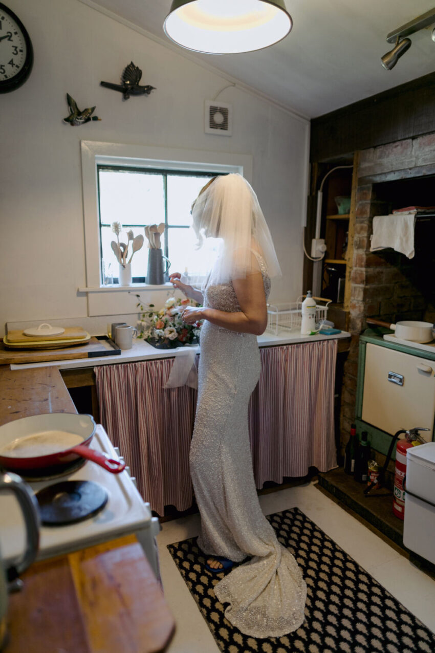 View of bride in kitchen