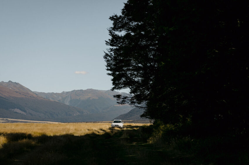 Car arriving in big landscape