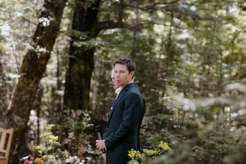 Groom nervously looking to Bride
