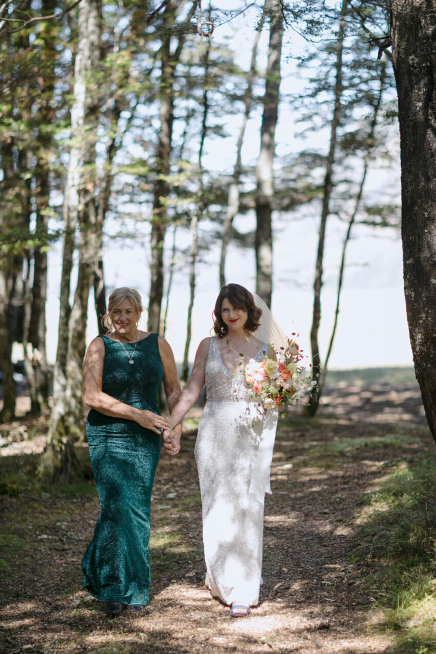 Bride and mother approach ceremony
