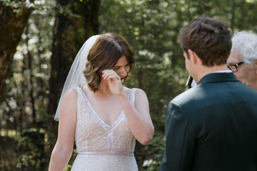 Bride saying vows during ceremony