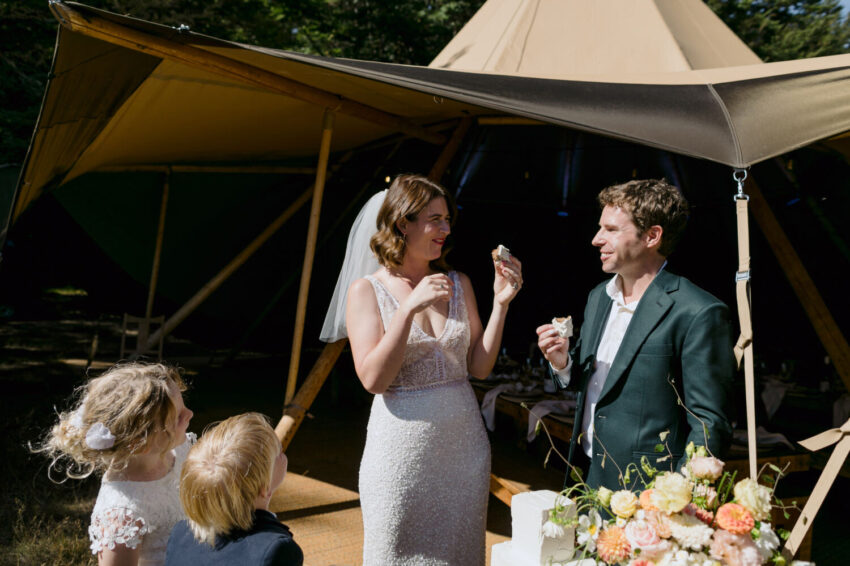 Bride and Groom eating cake