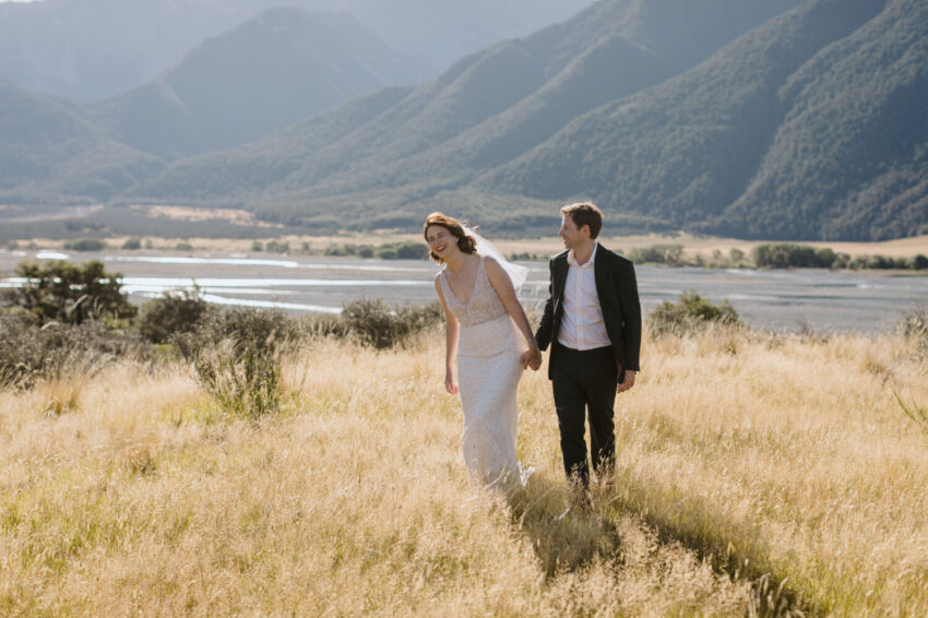Bride and Groom happily walking and laughing