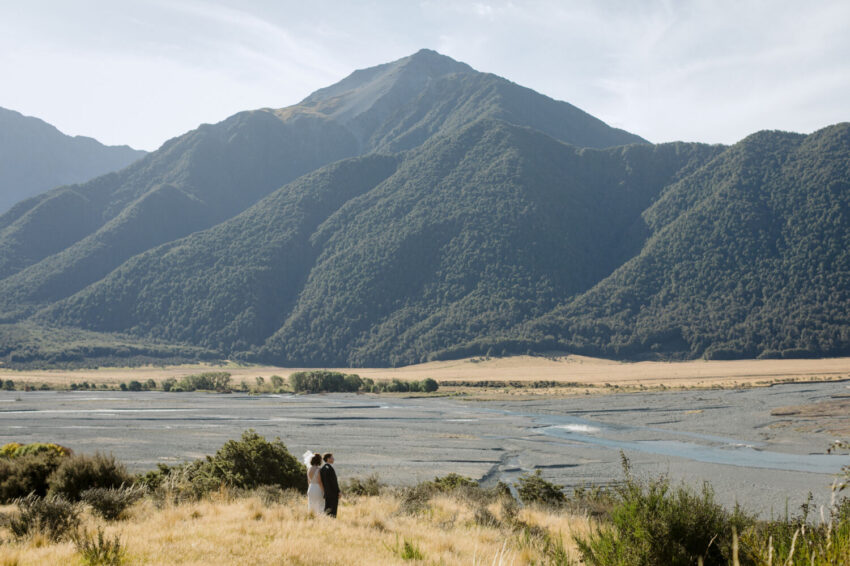 Bride and Groom looking at the huge stunning view