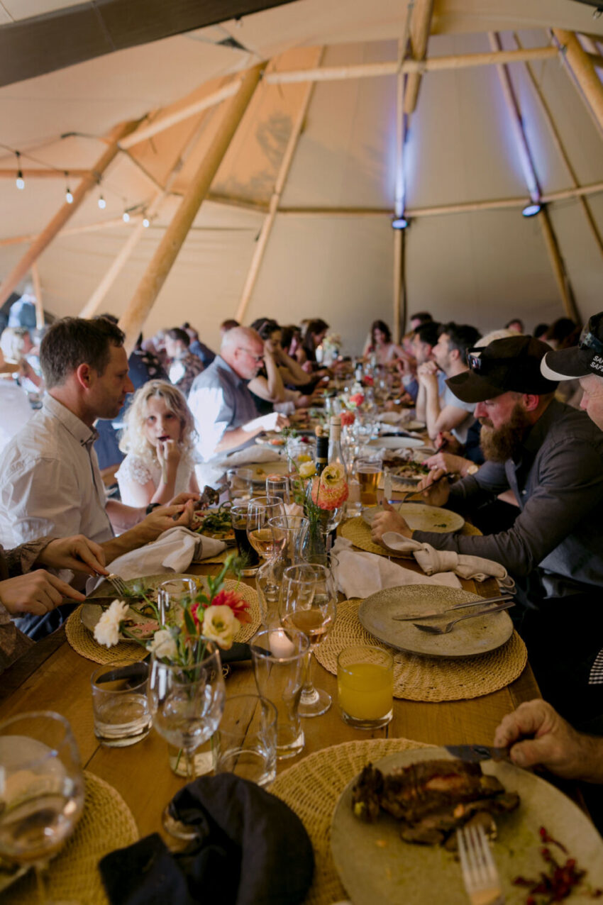 Guests feasting at the wedding dinner