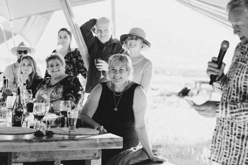 Mother of the bride enjoying speeches