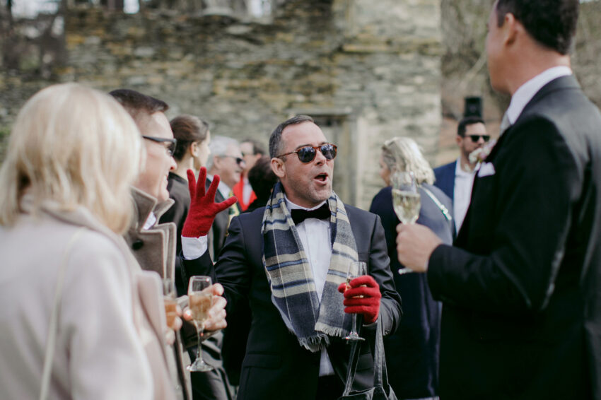 Candid of stylish guest in an animated moment of joy
