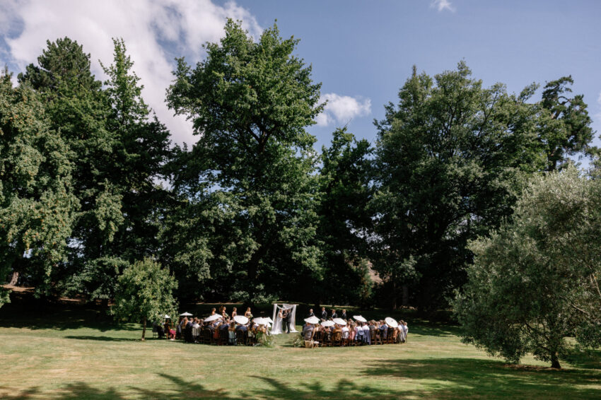 wide shot of ceremony site with the ceremony underway