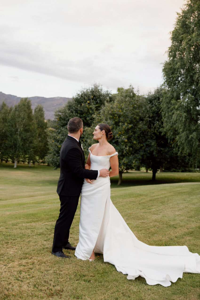 Quiet moment with the Bride and Groom looking out at view