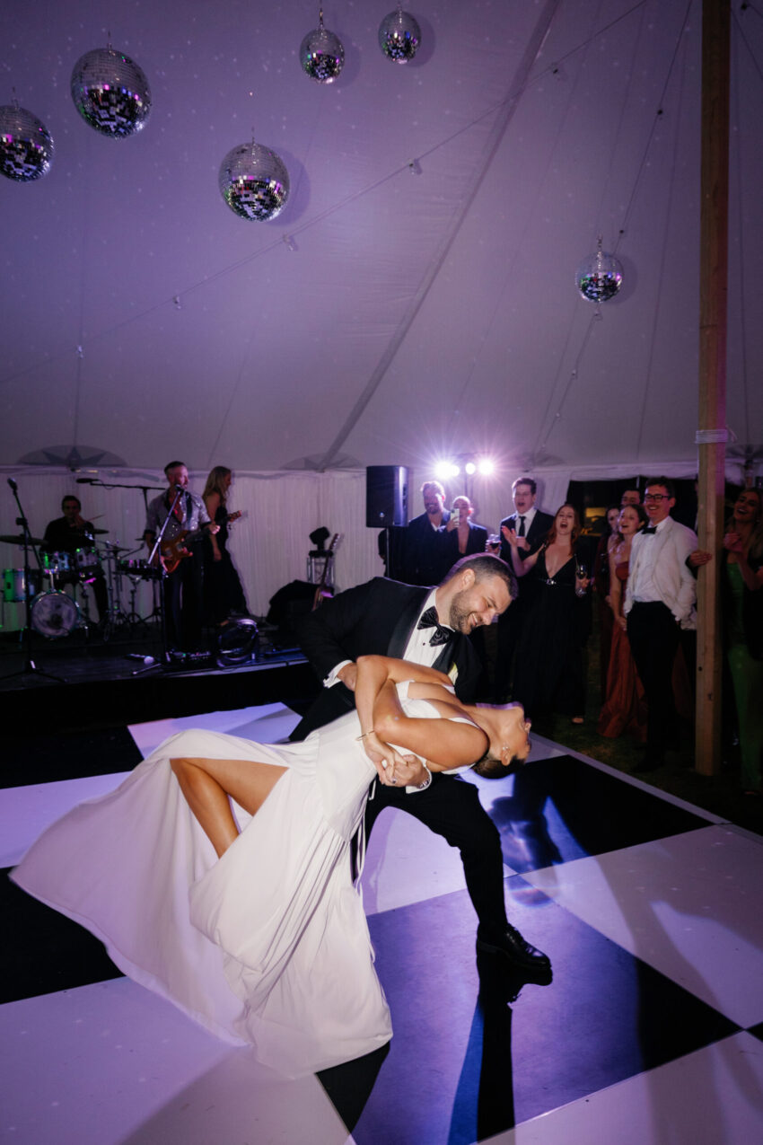 The first dance, groom is dipping the bride