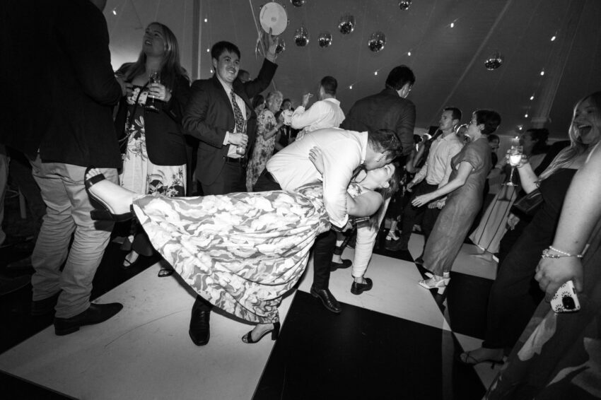 Guests doing a dip kiss on the dancefloor